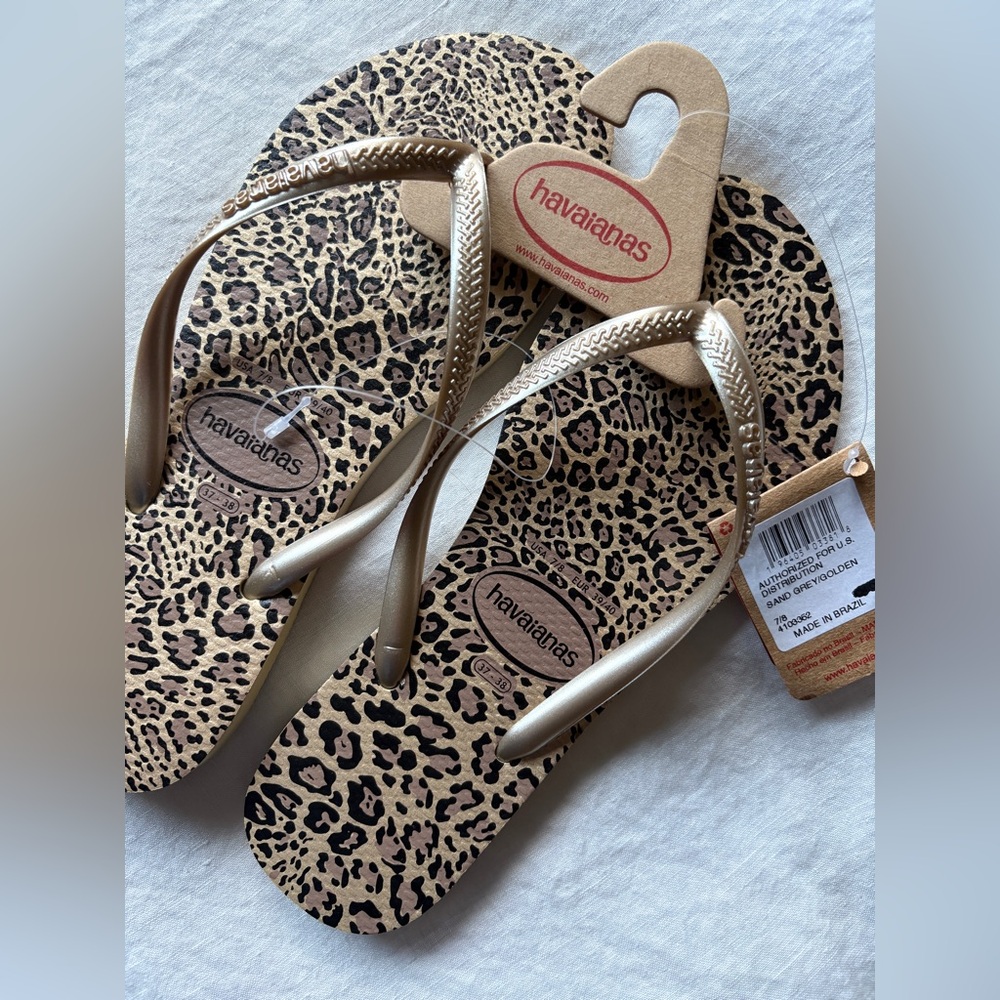 Havaianas Flip Flops, size 7, sand/gold animal print.